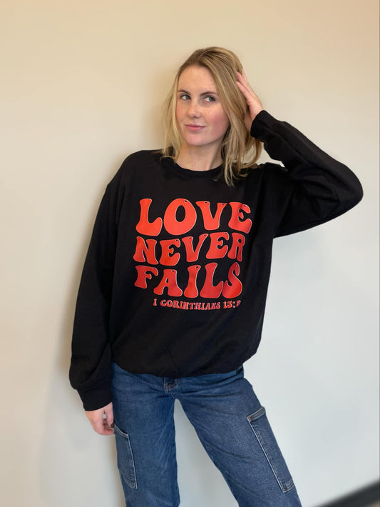 Love Never Fails Sweatshirt